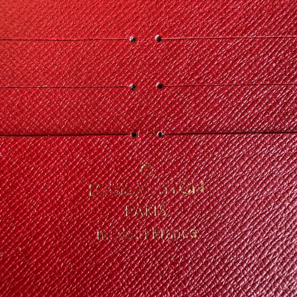 Louis Vuitton Red Textured Leather Card Sleeve with Black Interior